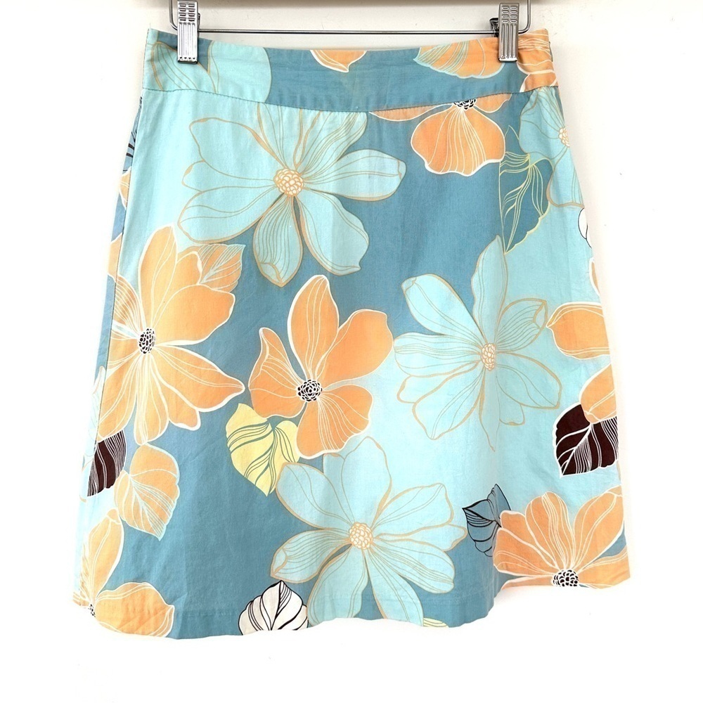 Violet a-line mini skirt in cotton/spandex blend, floral tropical print, unlined
